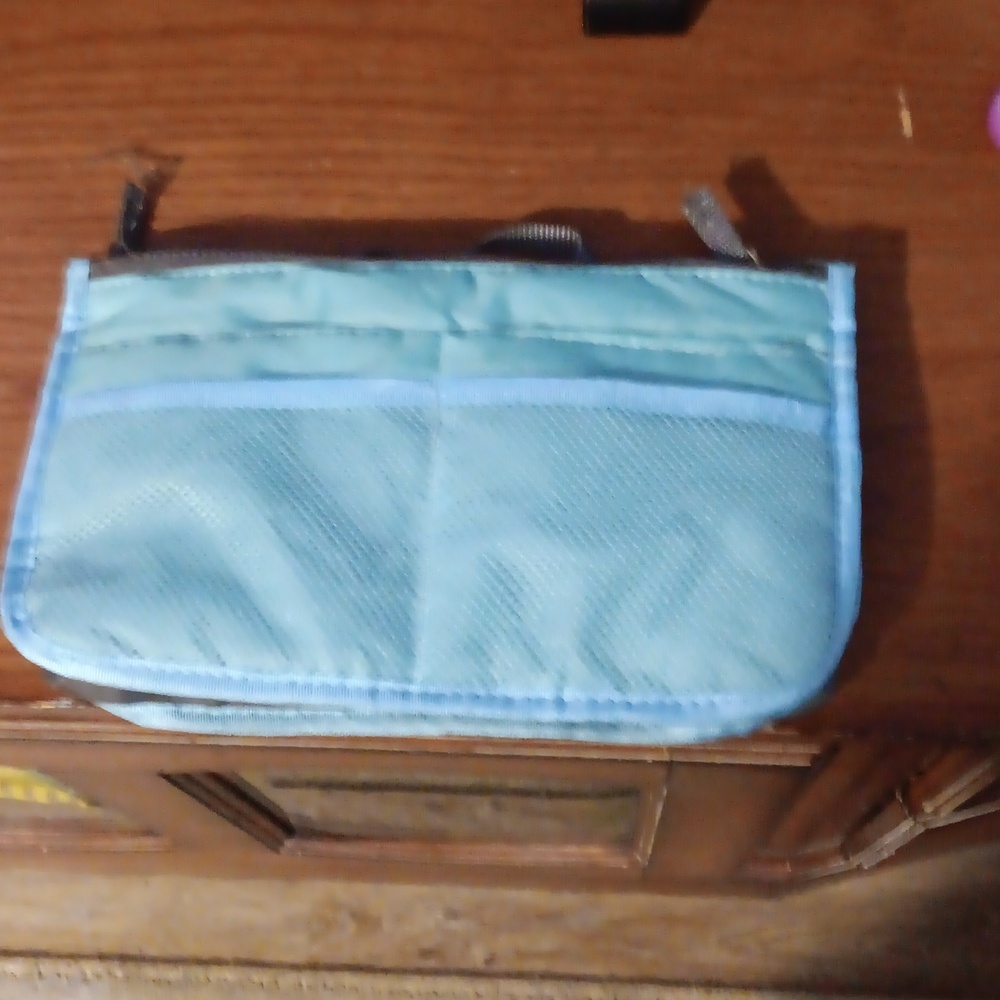 A blue organizer bag
